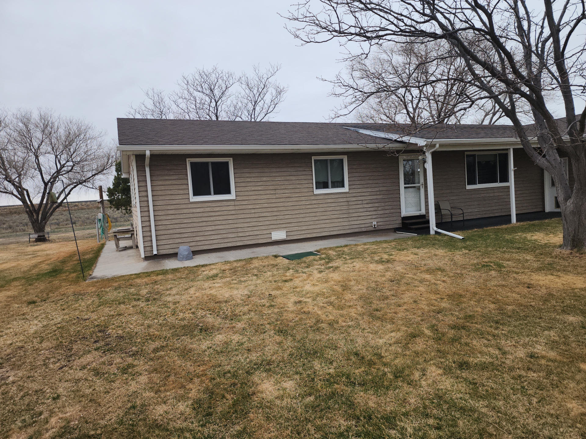 Before — Nicewinder Residence — Siding & Stone Accents in Newcastle, WY